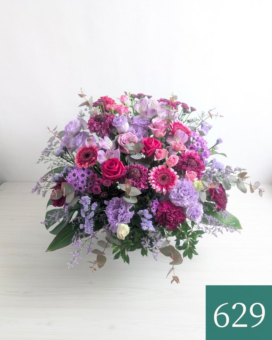 紫色、パープルの花束、アレンジメント。70歳の古希、77歳の喜寿を祝うお花のギフト、贈り物