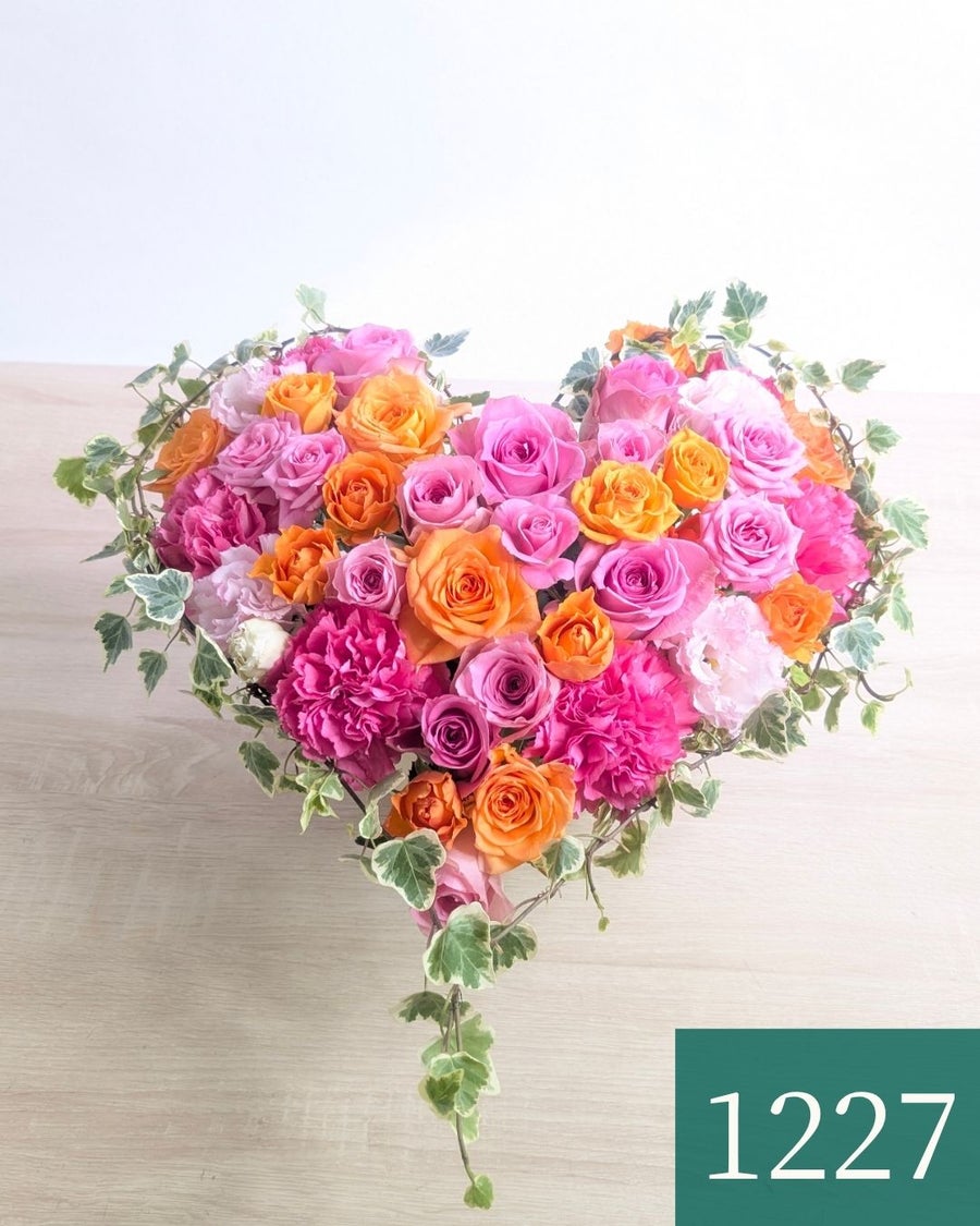 ハート型アレンジメント 「Liebe（リーベ）」・明るいピンクオレンジ（キャンディ）｜おしゃれな花束・アレンジ通販【最短翌日着】｜花以想（はないも）